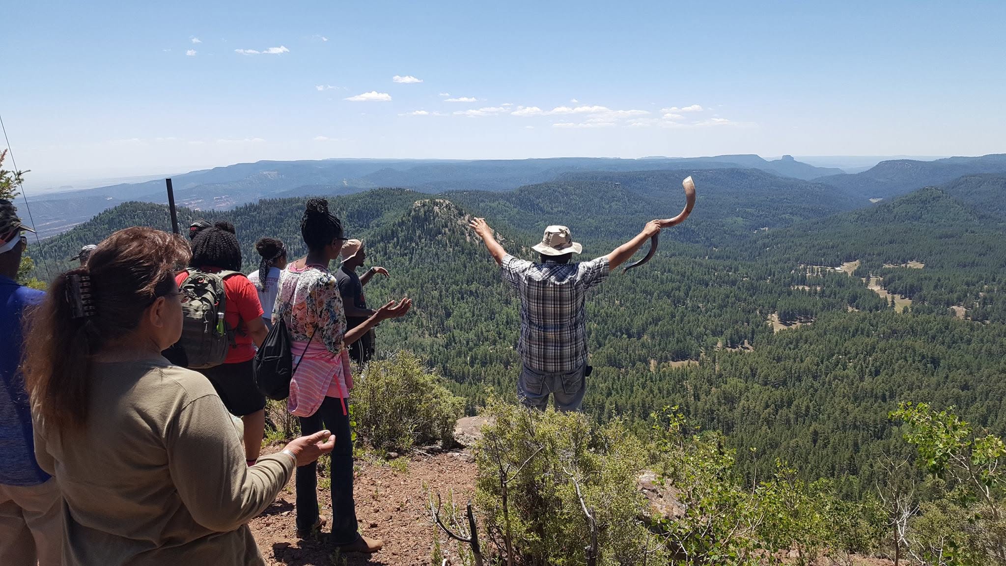 Prayer and worship overlooking the mountains of the Navajo Diné Nation
